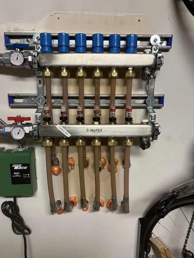 Plumber performing Water Heater Repair at a residential property in Upper Grand Lagoon